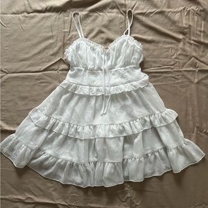 White ruffle mini dress
